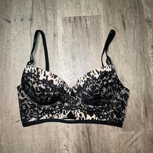 Leopard print push up bra with corset style back. Size: 34C